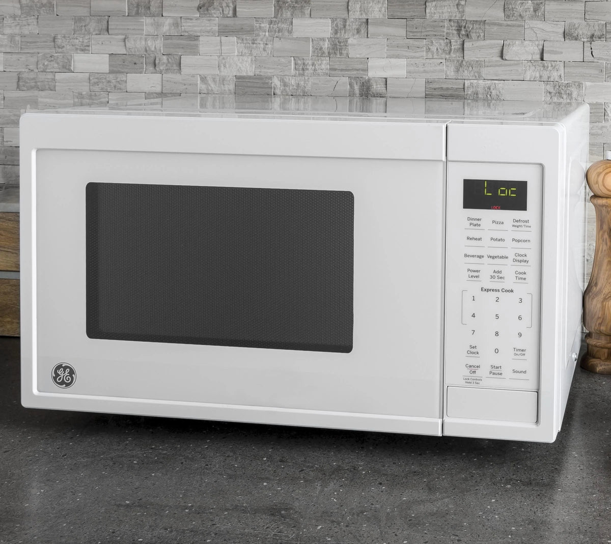 0.9 Cubic Foot White Countertop Microwave Oven O64031