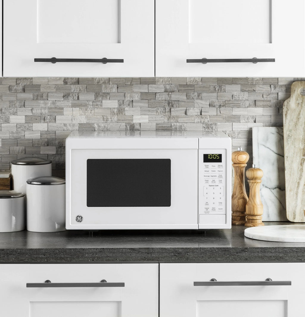 0.9 Cubic Foot White Countertop Microwave Oven O64031